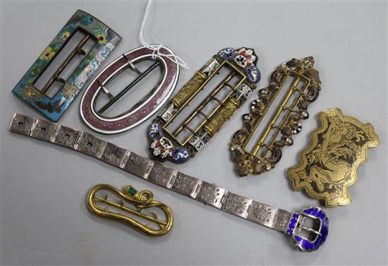 Six assorted buckles including one Edwardian silver and enamel and a white metal and enamel bracelet.